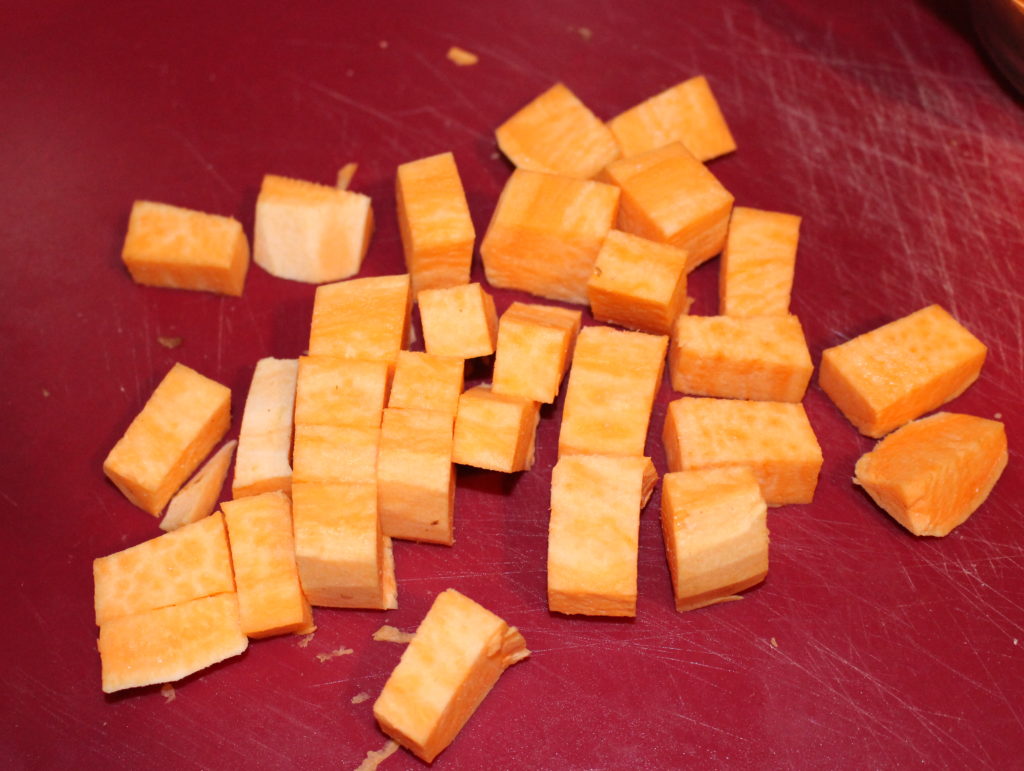 Diced sweet potatoes for oven roasted sweet potato recipe.